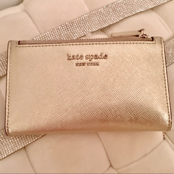 kate spade Handbags - Beautiful gold leather Kate spade wallet nice size